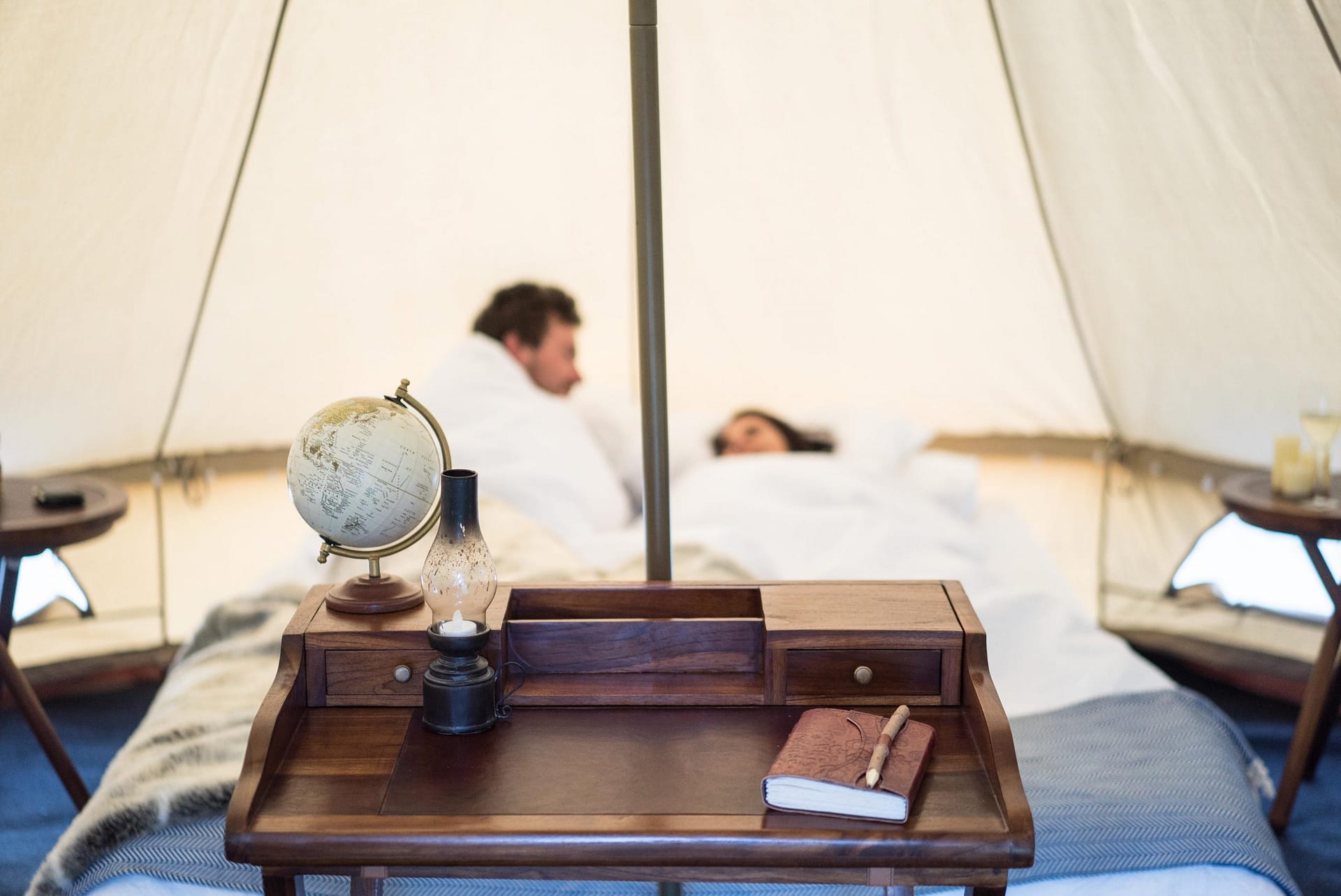 couple in bed in tent